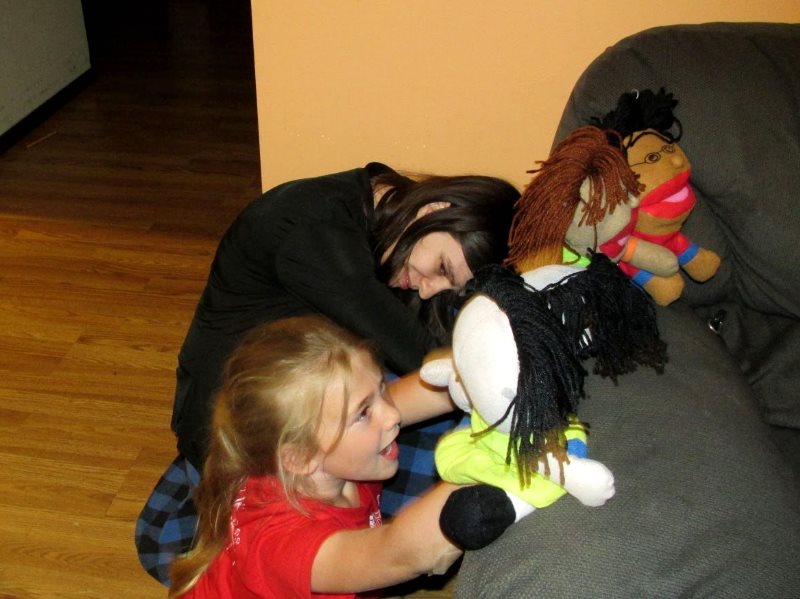 Addie and Amber, with puppets