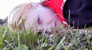 M in the grass