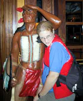 M straddling a Native American