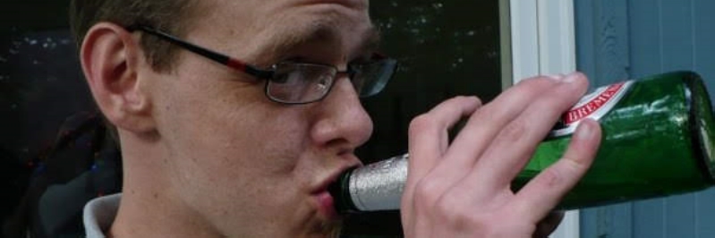 Stevehen drinking a beer while looking at the camera